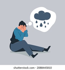 Unhappy man hugs his knees and sits on the floor with rainy cloud above his. Sad boy is crying. Male character feels depression, sorrow, grief. Mental disorder or illness concept. Vector illustration