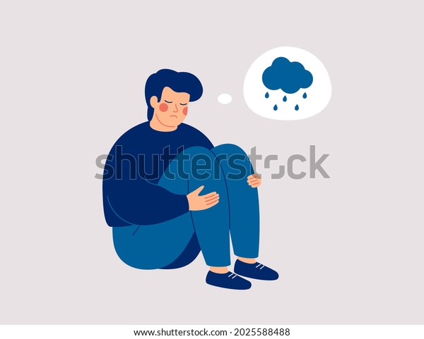 Unhappy man hugs his knees and sits on the\
floor with rainy cloud above his. Sad boy is crying.  Male\
character feels depression, sorrow, grief. Mental disorder or\
illness concept. Vector\
illustration