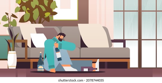 unhappy sad man drinker with bottles alcoholic drinking alone depressed addicted drunk guy having problem alcohol addiction