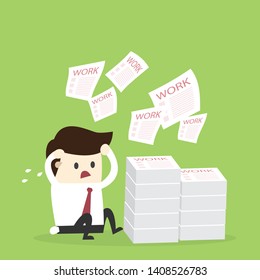 Unhappy stressed man sit at work with a lot of papers, piles of documents, Office work load . 