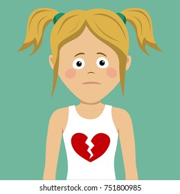 Unhappy teenager girl with broken heart on her t-shirt