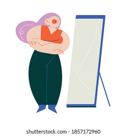 Unhappy teenager girl looking at mirror and and suffering from overweight problems