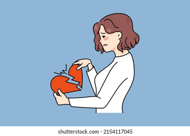 Unhappy woman hold breaking heart suffer from relationship breakup or separation. Upset distressed girl struggle with split or divorce. Heartbroken person. Flat vector illustration. 