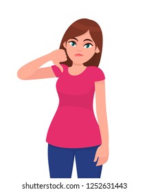 Unhappy woman showing or gesturing thumb down sign. Girl doing a negative gesture, looking with negative expression and disapproval. Bad, dislike, disapprove, disagree concept illustration in vector.