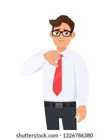 Unhappy, young handsome man showing/gesturing thumbs down sign. Bad, dislike, disagree, disapprove, negative human emotions, facial expressions, feelings concept illustration in vector cartoon style.
