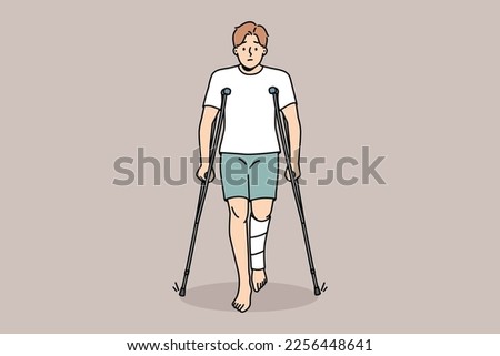 Unhappy young man with leg injury walking on crutches. Upset injured male with limb trauma suffer walking or standing. Healthcare and recovery. Vector illustration. 