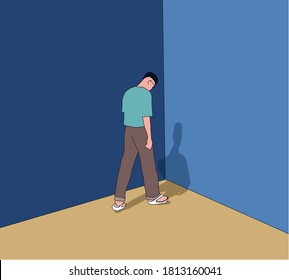 Unhappy Young man stand in front of a wall looking down feeling bad, hopeless, depressed, frustrated and repressed.Unemployment after covid-19 lock down.