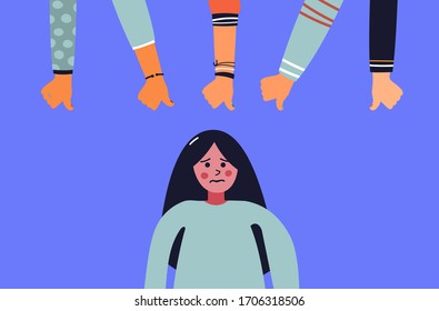 Unhappy young woman surrounded by hands with thumbs down at her. Concept of victim blaming, public disapproval, humiliation, abjection, guilt.