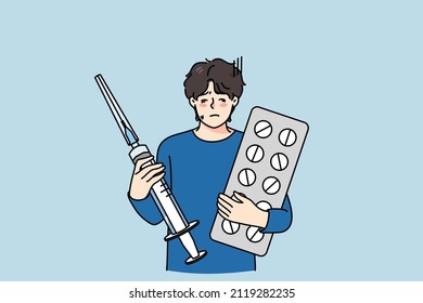 Unhealthy young man with pills and syringe get treatment from covid-19 virus. Unwell guy with drugs medication cure from coronavirus disease. Flu or fever problem. Vector illustration. 