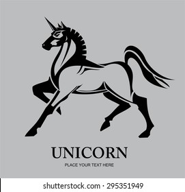 unicorn. black standing unicorn isolated on grey background.
