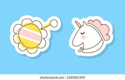 Unicorn Head and Rattle as Infant Sticker on Blue Background Vector Set