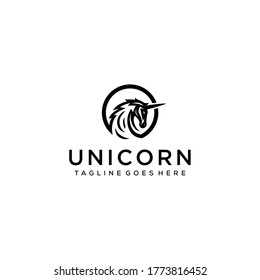 Unicorn head silhouette with sharp horns in a circle that protects it from the outside logo design.
