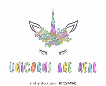 Unicorn horn in floral wreath tiara illustration for card, t shirt print design. Fairy vector unicorn meme head with closed eyes, horn, flowers, quote phrase. Unicorns are real quote in rainbow colors