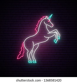 Unicorn neon sign. Magical unicorn standing on hind hooves. Bright emblem. Vector illustration in neon style.