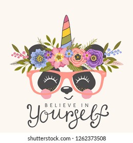 Unicorn panda face with floral wreath, glasses, smile. Believe in Yourself slogan. Cute cartoon vector illustration