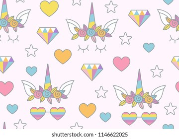 Unicorn, rainbow, sweets and other objects seamless pattern with light pink background. Cute magic ornament for textile, fabric, packaging design. Perfect for baby girl birthday celebration design.
