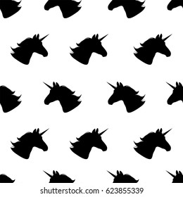 Unicorn. Seamless pattern.Vector illustration. Black unicorns on white. Repeating background. Fabric print. Textile design. Fairytale horses. Simple unicorn wallpaper.