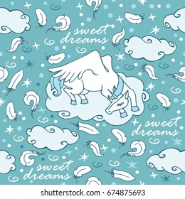 Unicorn sleeps in the clouds / A seamless pattern with an unicorn, feathers and clouds. Great for home textile.