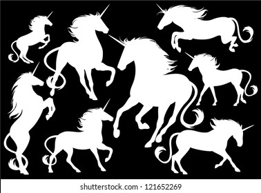 unicorns fine vector silhouettes - white outlines over black