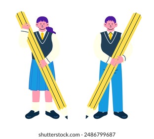 Uniformed female and male students holding large pencils in their hands