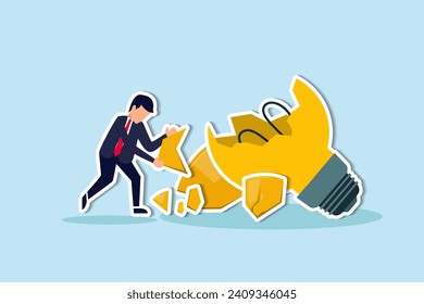 Uninspired or motivation after business failure, burnout or exhausted from crisis, no new idea or inspiration concept, depressed business man sadly standing with fail old broken lightbulb idea.