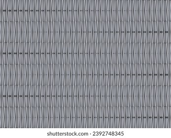 Unique black metal texture steel background. Perforated metal sheet.