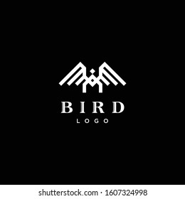 Unique logo design of bird and wings with black background - EPS10 - Vector.