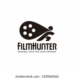 Unique logo design with the concept of a person holding a piece of a film cassette.