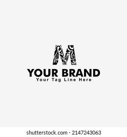 unique logo design template letter M in tribal style, monogram