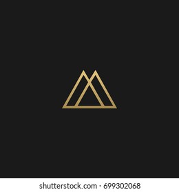 Unique modern creative elegant geometric fashion brands black and gold color M initial based letter icon logo.