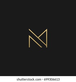 Unique modern creative elegant geometric fashion brands black and gold color M initial based letter icon logo.