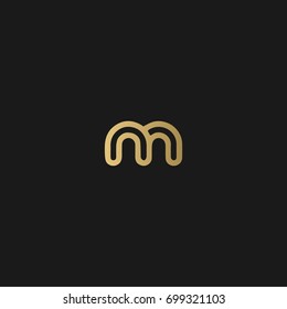 Unique modern creative elegant geometric artistic black and gold color MM M initial based letter icon logo.