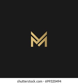 Unique modern creative elegant luxurious artistic black and gold color M initial based letter icon logo.