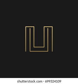 Unique modern creative elegant unusual artistic black and gold color MU UM M U initial based letter icon logo.