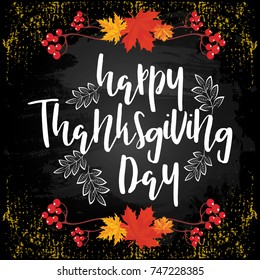 Unique vintage style handwritten lettering-thanksgiving day- on black chalkboard background with silhouettes of autumn leaves and rowan. Vector illustration for posters, brochures, greeting cards.