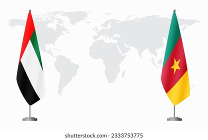 Emiratos Árabes Unidos y Camerún banderas para una reunión oficial en el fondo del mapa mundial.