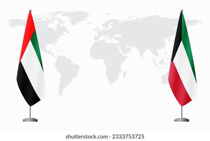 United Arab Emirates and Kuwait flags for official meeting against background of world map.