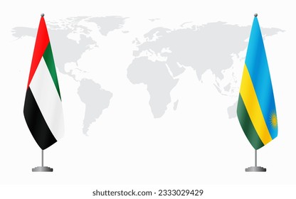 United Arab Emirates and Rwanda flags for official meeting against background of world map.