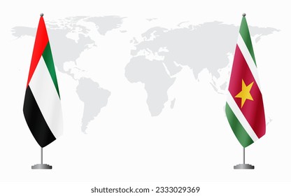 United Arab Emirates and Suriname flags for official meeting against background of world map.