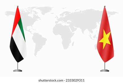 United Arab Emirates and Vietnam flags for official meeting against background of world map.