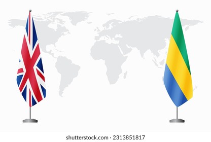 United Kingdom and Gabon flags for official meeting against background of world map.