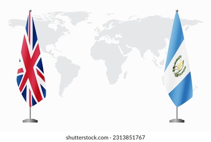 United Kingdom and Guatemala flags for official meeting against background of world map.