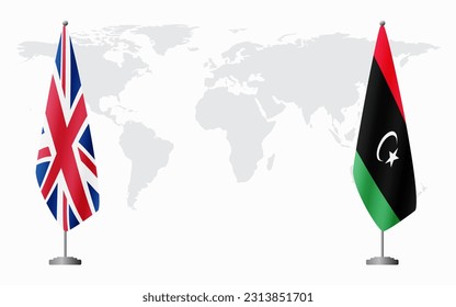 United Kingdom and Libya flags for official meeting against background of world map.