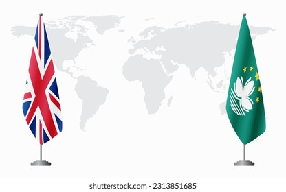 United Kingdom and Macau flags for official meeting against background of world map.
