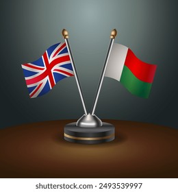 United Kingdom and Madagascar table flags mark the relationship on a gradient background