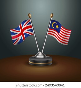 United Kingdom and Malaysia table flags mark the relationship on a gradient background