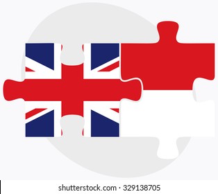 United Kingdom and Monaco Flags in puzzle isolated on white background