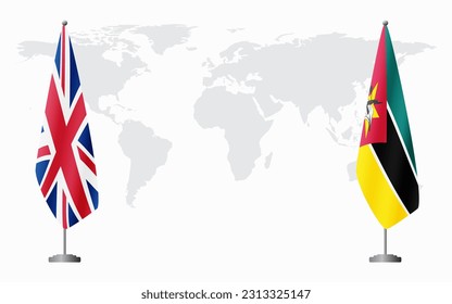 United Kingdom and Mozambique flags for official meeting against background of world map.