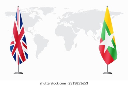 United Kingdom and Myanmar flags for official meeting against background of world map.