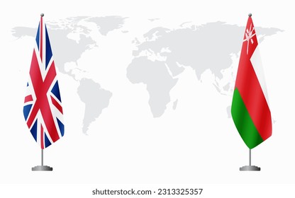 United Kingdom and Oman flags for official meeting against background of world map.